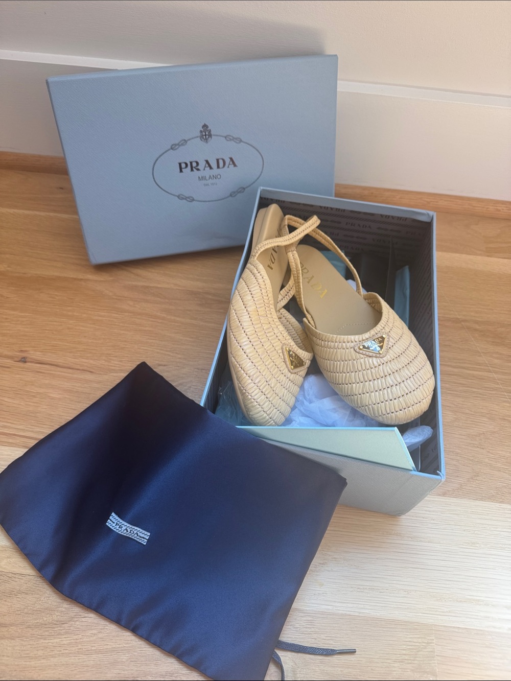 Prada Cream Woven Slingback Loafers with Triangle Logo